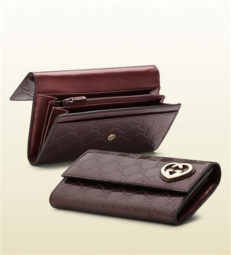 gucci interlocking heart wallet|Gucci wallet with g tag.